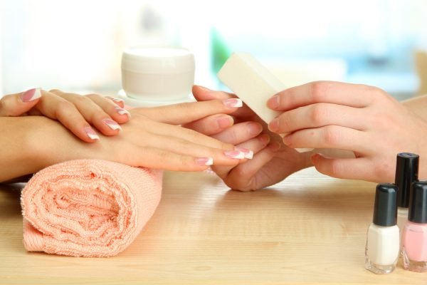 bigstock-Manicure-process-in-beauty-sal-43992802